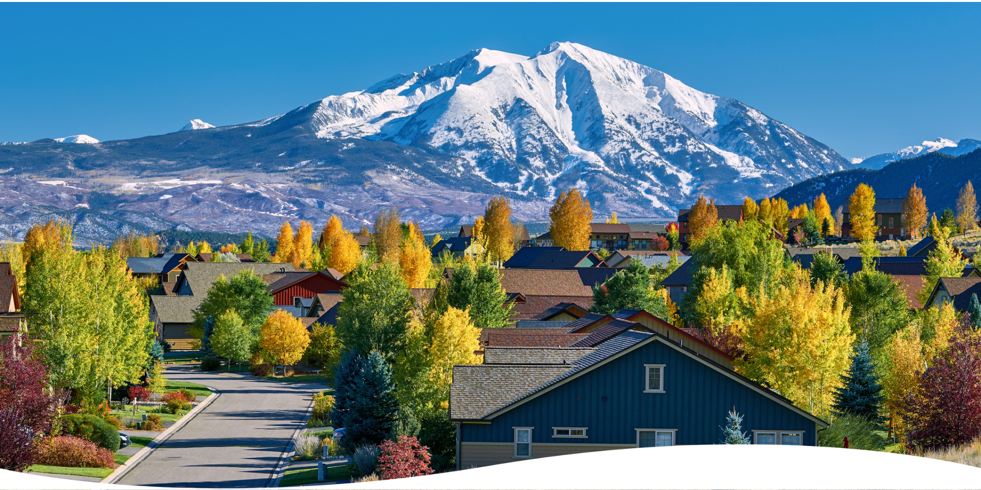Colorado Renters Insurance: What You Need to Know. A Colorado suburb beneath the Rocky Mountains.