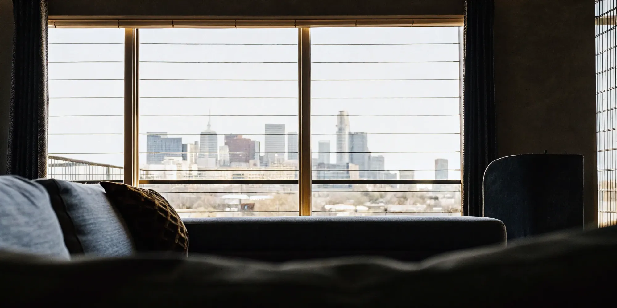 Dallas skyline view from apartment. Renters insurance protects your belongings.